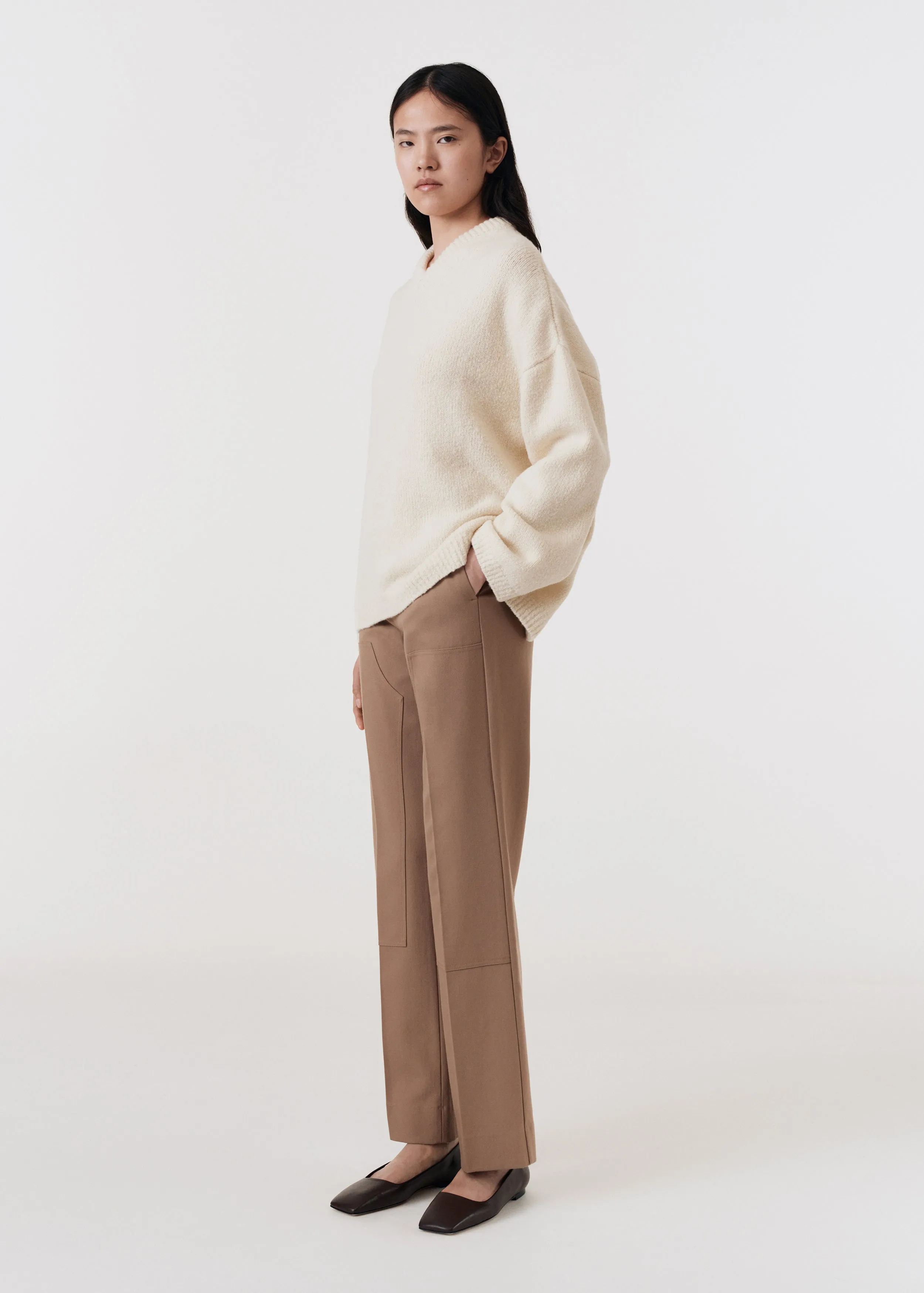 Asymmetric v-neck merino sweater off white