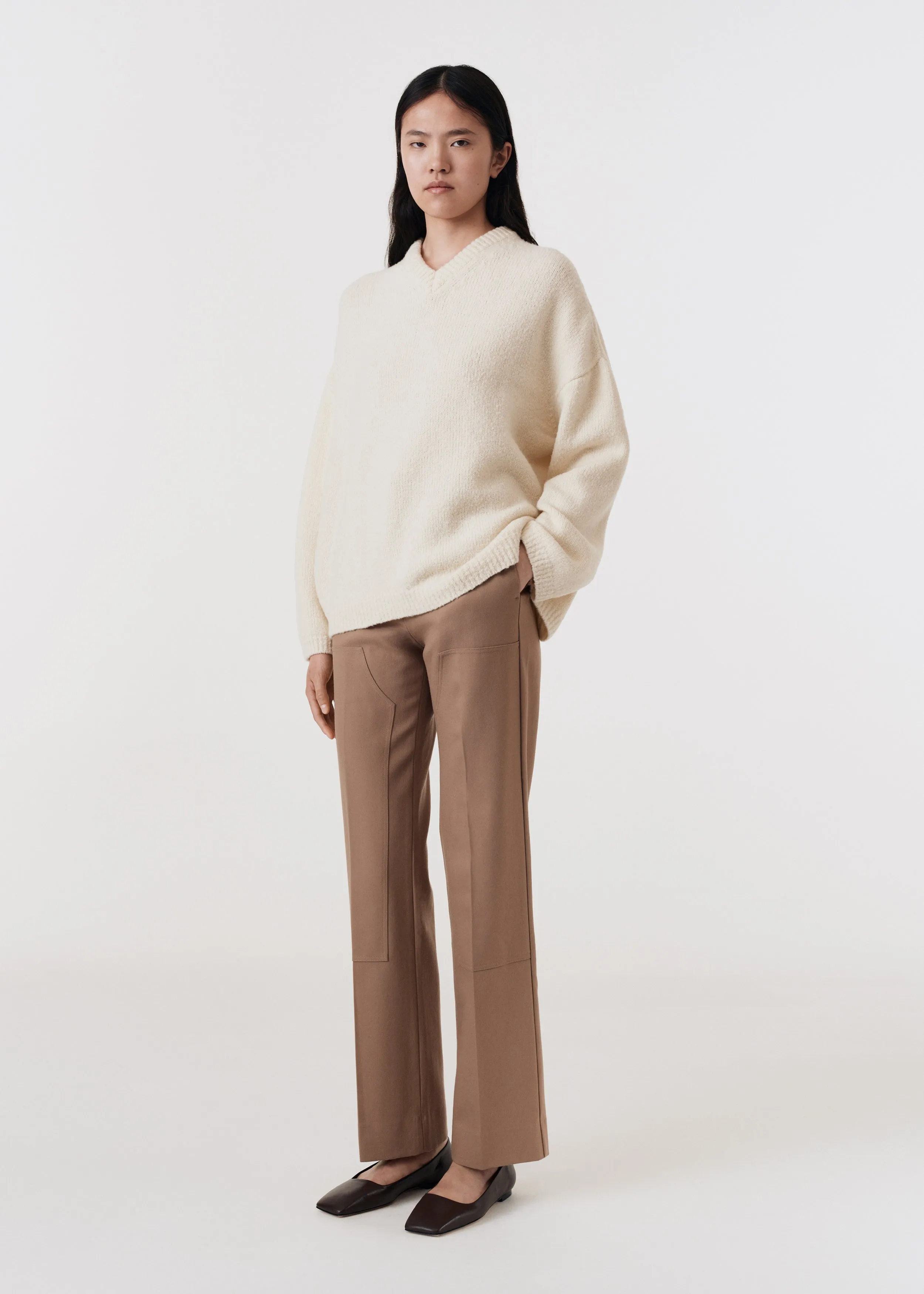 Asymmetric v-neck merino sweater off white